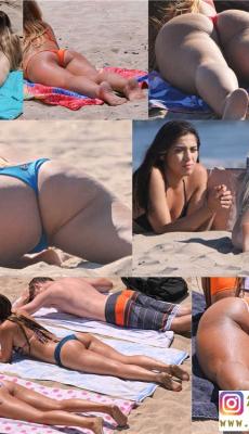 沙滩享受日光浴的两个比基尼美眉美腿翘臀[MP4/309M]